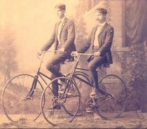 Barton and Baker on bicycles